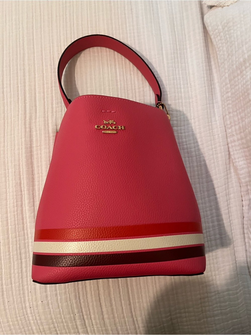 Coach Pink Pebbled Leather Bucket Bag with Stripe Accent